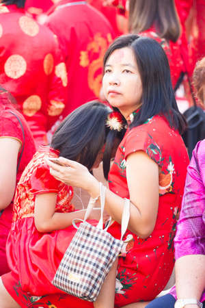 NAKHON SAWAN, THAILAND - FEBRUARY 8 : unidentified asian woman with her daughter at Chinese New Year festival on February 8, 2019 in  Nakhon Sawan, Thailand.のeditorial素材