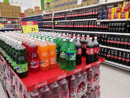 CHIANG RAI, THAILAND - FEBRUARY 12 : soft drink bottles on shelves sold in supermarket  on February 12, 2019 in Chiang rai, Thailand.のeditorial素材