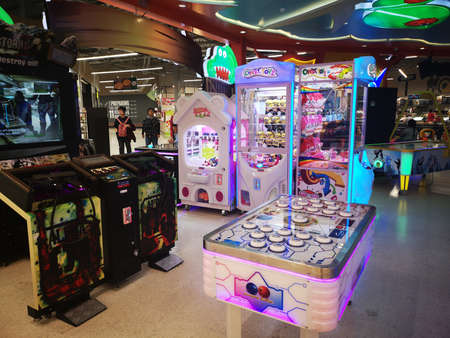 CHIANG RAI, THAILAND - MARCH 7, 2019 : Unidentified people walking at arcade game and entertainment...