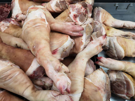 pile of raw pork legs in supermarket, Thailand.の写真素材