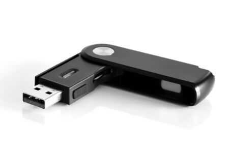 A flash drive on white with soft shadow 