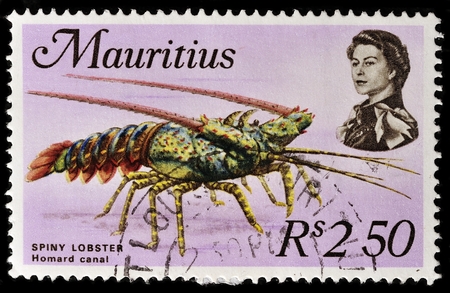 MAURITIUS - CIRCA 1969: A stamp printed in Mauritius shows spiny lobster, circa 1969.のeditorial素材