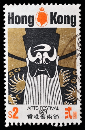 HONG KONG-CIRCA 1974: A stamp printed in Hong Kong shows a Zhongguo Lianpu, types of facial make-up in traditional Chinese opera, circa 1974のeditorial素材