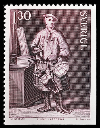 SWEDEN - CIRCA 1978: A stamp printed by SWEDEN shows Swedish botanist, physician, and zoologist Carl Linnaeus (Carl von Linne) in the traditional dress of the Sami people of Lapland, circa 1978のeditorial素材