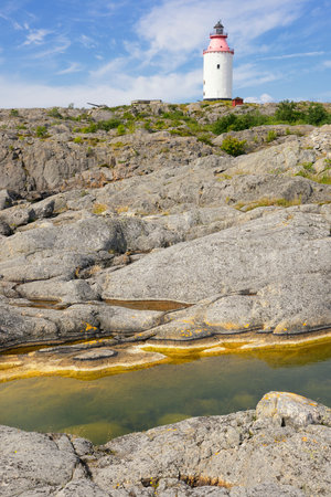 Lighthouse in Swedish village Landsort on the island of Ojaの写真素材