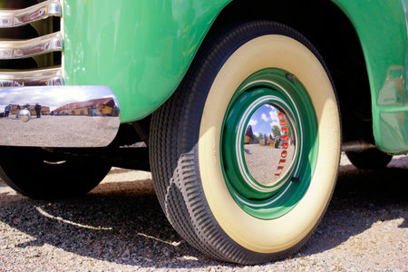 Chrome hub cap on a vintage Chevrolet pickupの写真素材