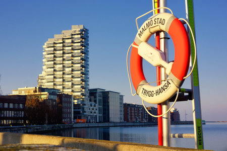 Stockholm, Sweden - Januari 20, 2026: Lifebuoy in Malm harbour gifted by the Swedish insurance company Trygg-Hansaのeditorial素材