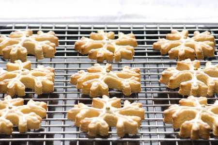 Decorated star shape christmas cookies on the backing tray