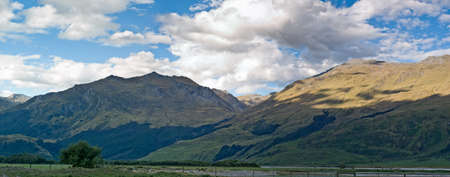A mountain range in New Zealand during sunsetの写真素材