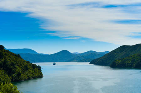 Incoming Ferry through a fjord into the Harbour の写真素材