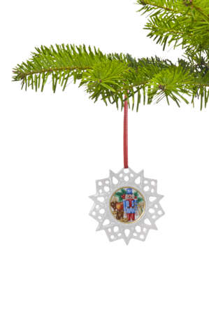 A Snow star shape ornament as Christmas tree decoration, over whiteの写真素材