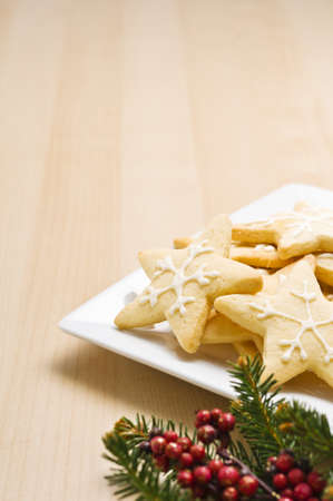 Christmas cookies on a plate in festive decorationの写真素材