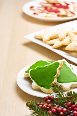Christmas cookies on a plate in festive decorationの写真素材