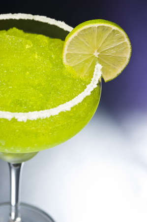 Classic margarita cocktail in front of different colored backgroundsの写真素材