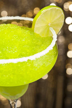 Classic margarita cocktail in front of different colored backgroundsの写真素材