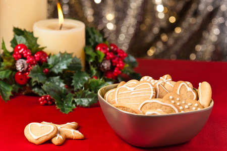 Christmas cookies, short bread in festive setting different shapesの写真素材