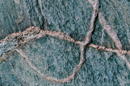 Granite with red enclosure which looks like a whale shape