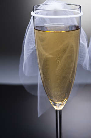 Champagne glass with conceptual heterosexual decorationの写真素材