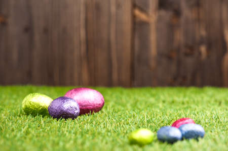 Chocolate Easter eggs in an outdoor settingの写真素材