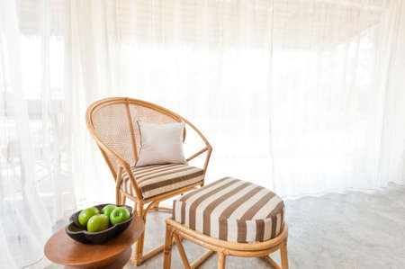 Beautiful bamboo rattan furniture in a summer setting
