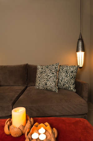 Corner of two seated sofa nice dark ambienceの写真素材