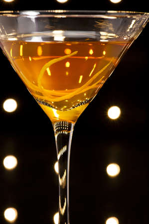 Manhattan cocktail over black and bright sparklesの写真素材