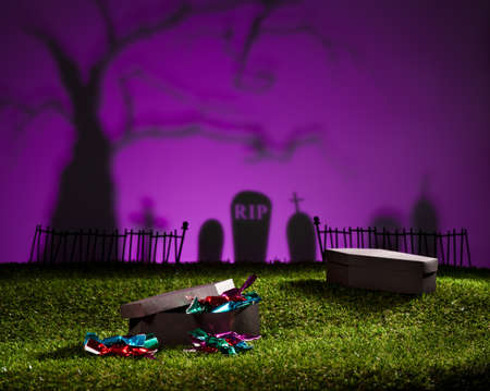 Halloween landscape with tree graveyard and sweetsの写真素材