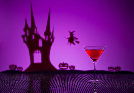 Halloween haunted house witch and a Cosmopolitan cocktailの写真素材