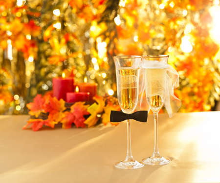 Champagne glasses with conceptual heterosexual decoration for straight couplesの写真素材