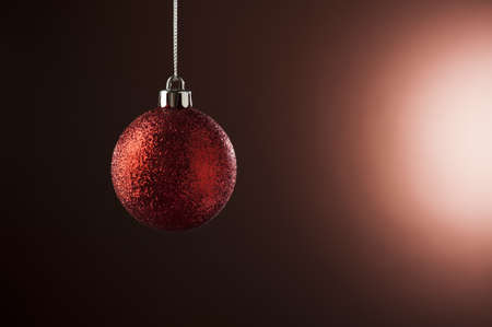 Christmas Bauble in simple color setting and side lighting の写真素材