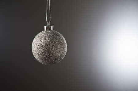 Christmas Bauble in simple color setting and side lighting の写真素材