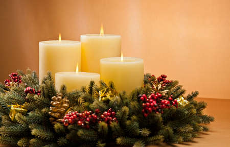 Advent wreath with burning candles for the pre Christmas timeの写真素材