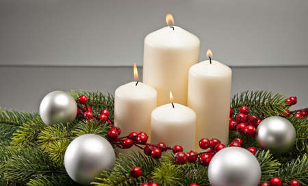 Advent wreath with burning candles for the pre Christmas timeの写真素材