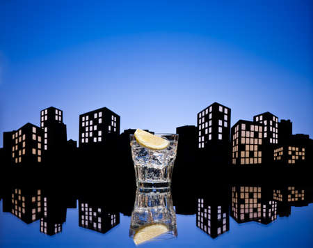 Metropolis Tom Collins cocktail in city skyline settingの写真素材