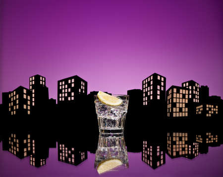 Metropolis Tom Collins cocktail in city skyline settingの写真素材