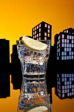 Metropolis Tom Collins cocktail in city skyline settingの写真素材