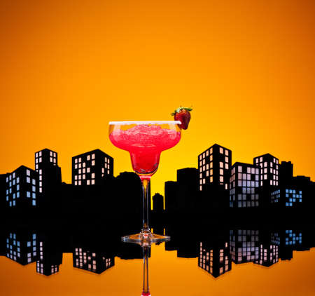 Metropolis strawberry Margarita  cocktail in city skyline settingの写真素材