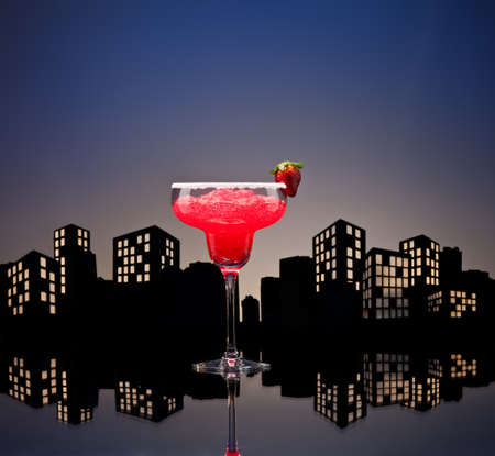 Metropolis strawberry Margarita  cocktail in city skyline settingの写真素材