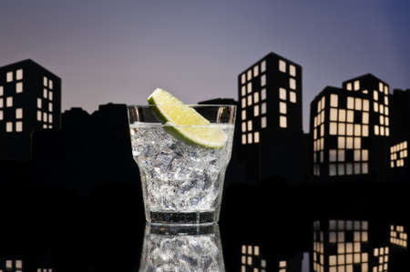 Metropolis Gin Tonic cocktail cocktail in city skyline settingの写真素材