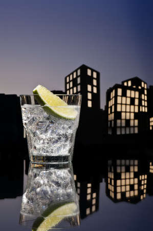 Metropolis Gin Tonic cocktail cocktail in city skyline settingの写真素材