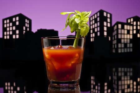 Metropolis Bloody Mary cocktail in city skyline settingの写真素材