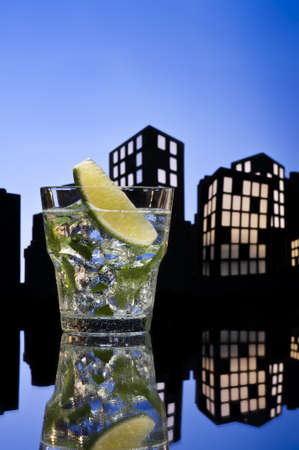 Metropolis Mojito cocktail in city skyline settingの写真素材