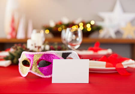 New Years dinner table setting with name card in redの写真素材