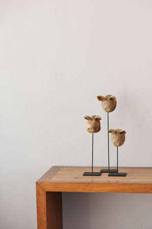 Three Pig heads on a side boardの写真素材