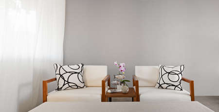white sofa seat with pillows in bright colorの写真素材