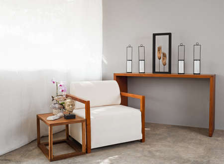 white comfortable sofa seat with interior design itemsの写真素材
