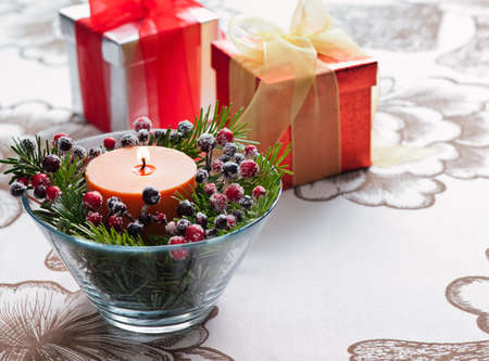 Present in winter decoration on a tableの写真素材