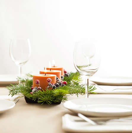 Christmas Dinner table setting in beige orange colorの写真素材