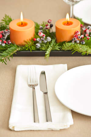 Christmas Dinner table setting in beige orange colorの写真素材