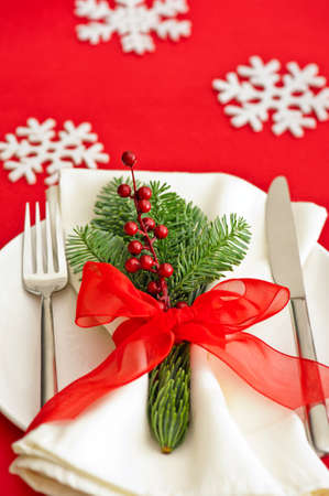 Christmas Dinner table setting with snow flakeの写真素材
